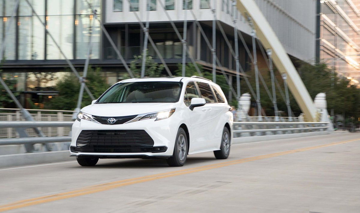 White 2022 Toyota Sienna on the road