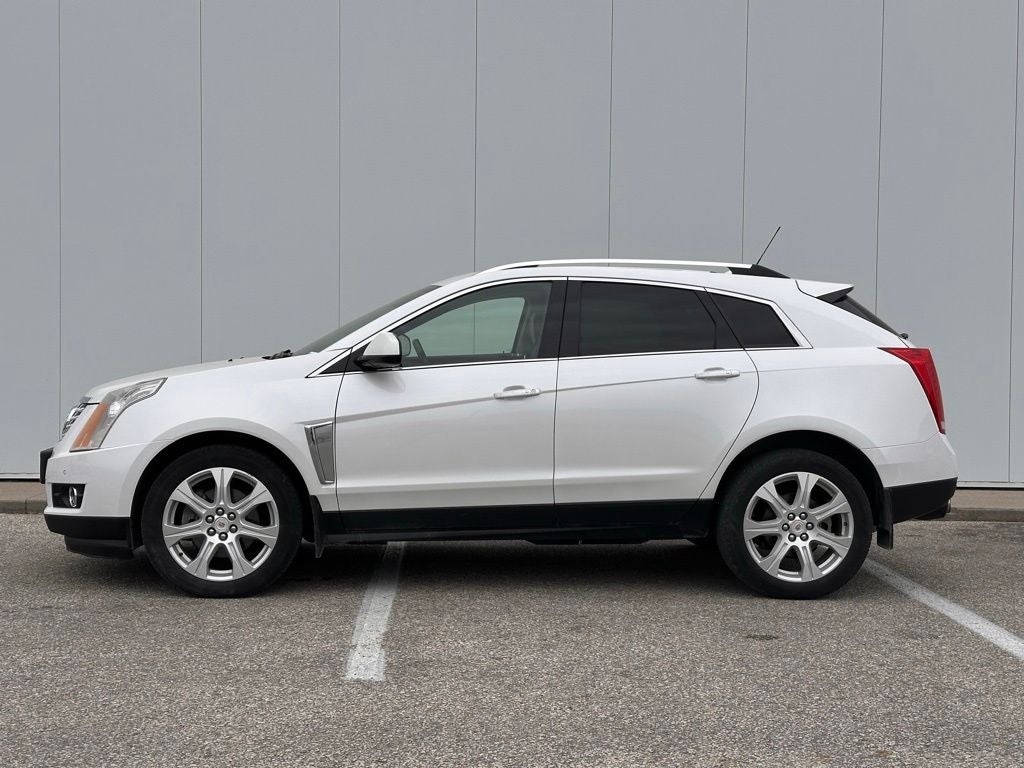 Used 2016 Cadillac SRX Performance Collection with VIN 3GYFNCE35GS581797 for sale in Fort Dodge, IA